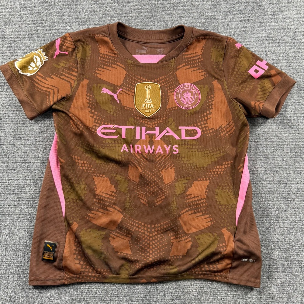 Puma Manchester City Jersey Youth M Brown Ederson 31 FIFA World Champions 2023